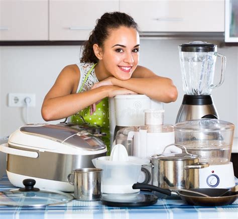 Girl With Kitchen Appliances At Home Stock Photo Image 68225063