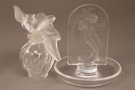 Lot Lalique Lot Of Perfume Bottles Nude Figure Case Auctions