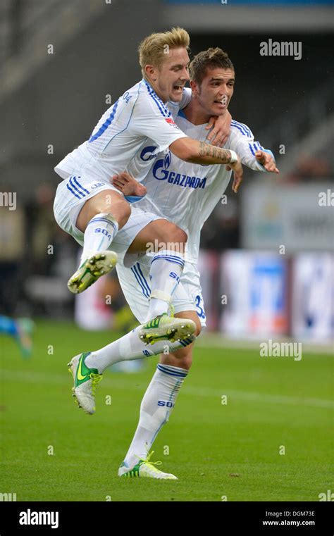 Celebration a goal, Roman Neustaedter carrying Lewis Holtby piggyback ...