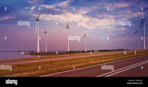 Wind turbines producing clean renewable energy Stock Photo - Alamy