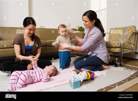 Mothers With Their Babies Stock Photo Alamy