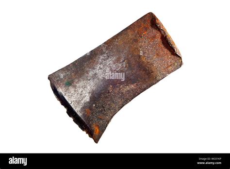 Close Up Photograph Of Battered Old Ax Head Without Handle Isolated On