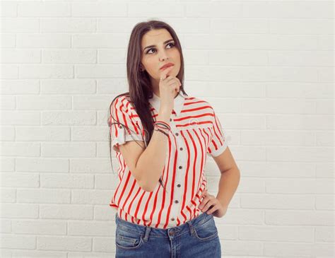 Back View Business Woman Writing On White Bricks Wall Background Stock