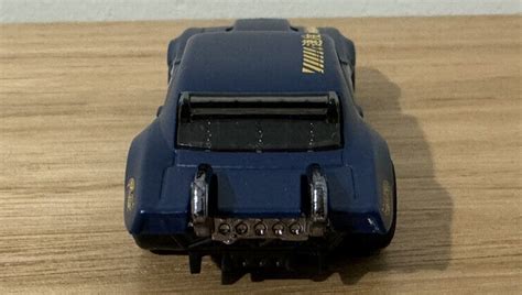 Машинка Базова Hot Wheels Custom Camaro Slammed HKG Blue купити в інтернет магазині