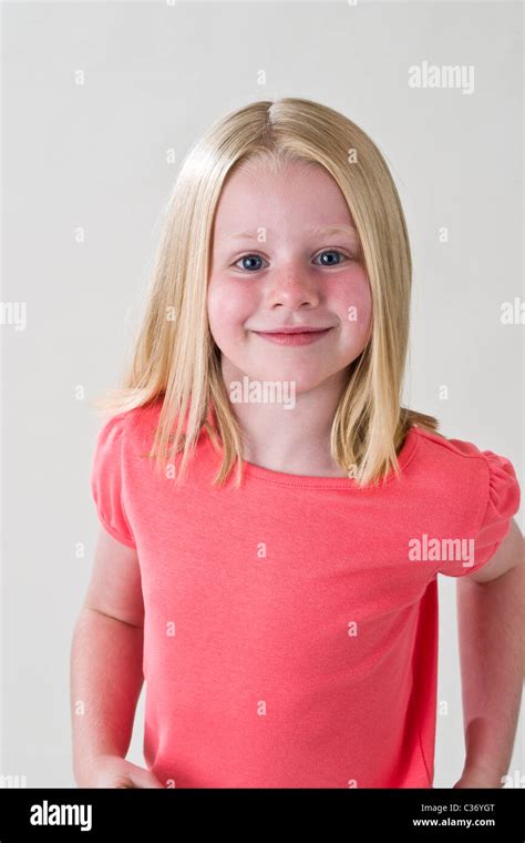 Happy young girl smiling 5-6 year old girl smile. MR © Myrleen Pearson Stock Photo - Alamy