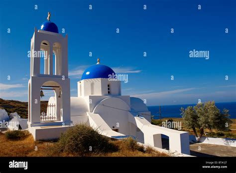 Blue Domed Greek Orthodox Church And Bell Tower Near Oia Ia