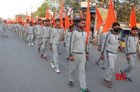 : Bhopal :Bajrang Dal workers holding saffron flags take part in a ...