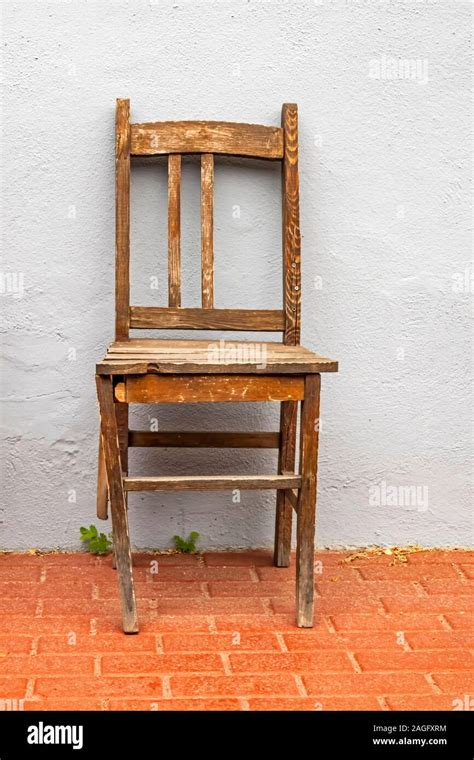 Old And Broken Chair On Floor Stock Photo Alamy