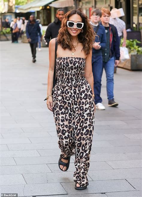 Myleene Klass Cuts A Stylish Figure In A Strapless Leopard Print Jumpsuit At Heart Fm Daily