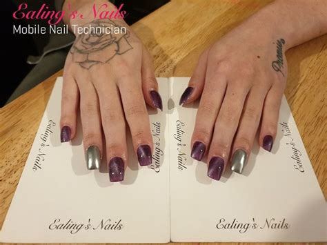 Acrylic Extensions With Purple Cateye Gel Polish And Chrome Feature Nail