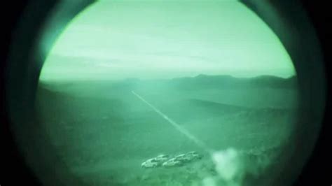 Night vision imagery of laser beam durin... | Stock Video | Pond5