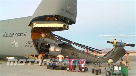 Loading Hh 60 Pavehawk Helicopters Onto A C 5 Galaxy Cargo Aircraft