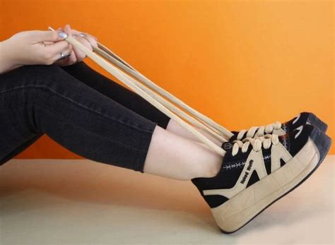 خرید و قیمت کتونی لژدار NAKED WOLFE مشکی کرم کد ترب