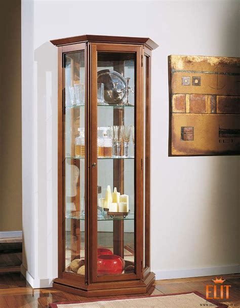 Шкаф витрина низкий напольный 95 фото