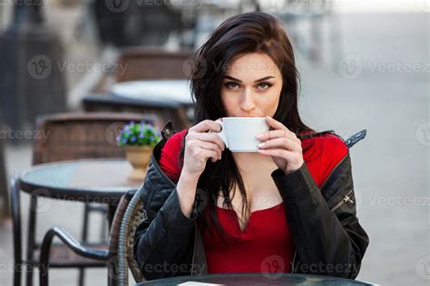 Young Stylish Woman Drinking Coffee In A City Streetstylish Hipster