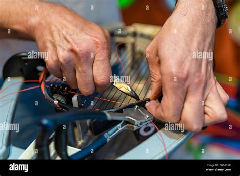 manual stringing   badminton racket  service stock photo alamy