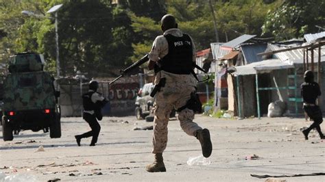 Hundreds of convicts escape as armed gangs storm Haiti's main prison in ...