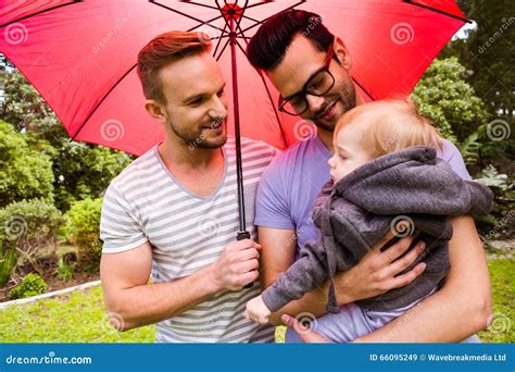 Pareja Gay Sonriente Con El Ni O Imagen De Archivo Imagen De Feliz