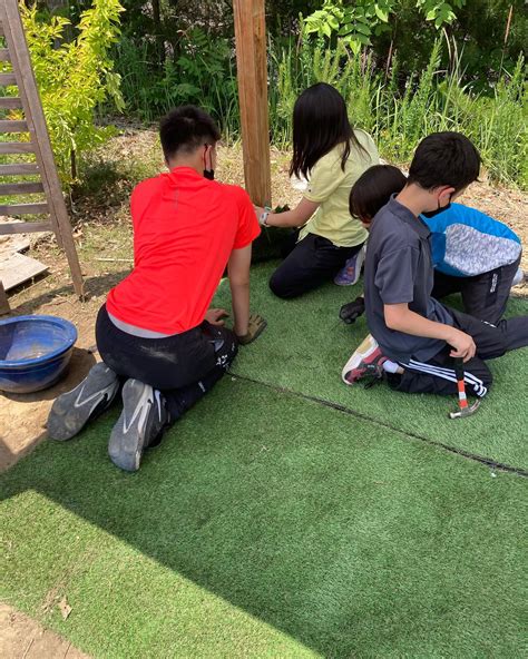 The year 7 and 8 students finishing another structure for the younger