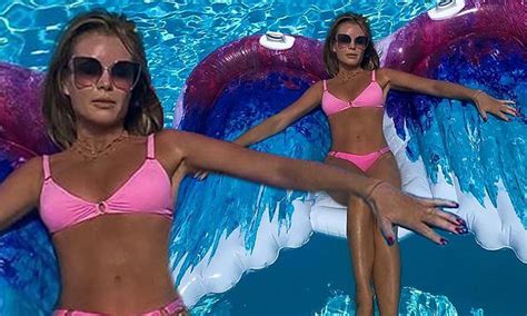 Amanda Holden Showcases Her Incredible Figure In A Pink Bikini While Relaxing In A Pool Daily