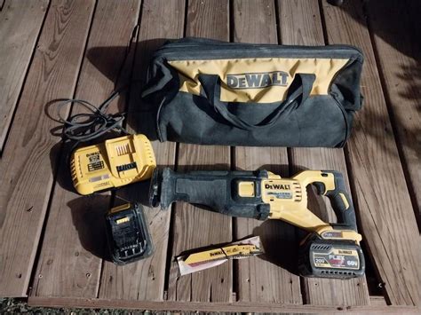 DEWALT CORDLESS SAWZALL WITH BATTERIES, CHARGER & BAG | EstateSales.org