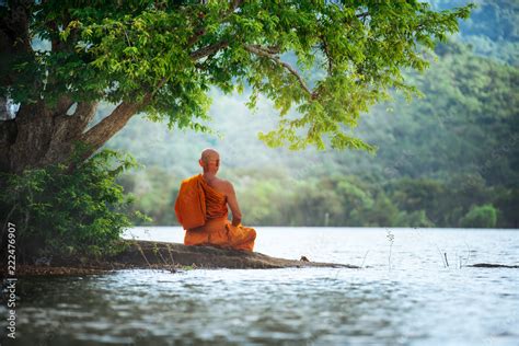 buddhist monk  meditation   river  beautiful nature