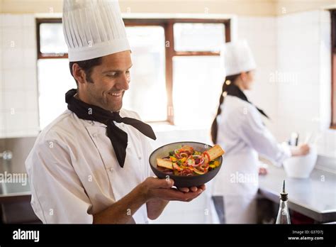 Happy Head Chef Presenting His Food Stock Photo Alamy