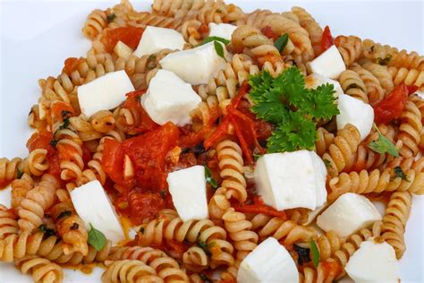 Pasta with mozzarella 12283880 Stock Photo at Vecteezy