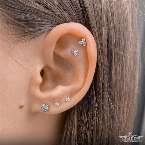 A Triple Lobe Piercing And A Flat Plus A Helix One I Did In 2020 Ear