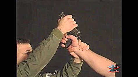 Krav Maga Gun Disarming Technique Youtube