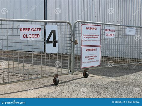 Keep Gate Latched Sign On Metal Fence Stock Photo Cartoondealer