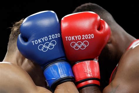 Moroccan Boxer Tries To Bite Opponent In Tokyo Olympics Defeat