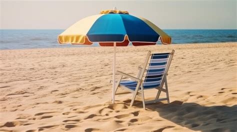 Premium Photo | Beach chair with umbrella on a beautiful white sand set ...