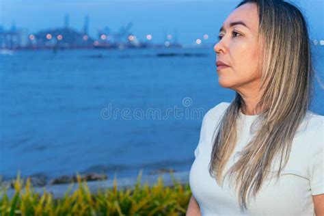 Serious Older Latina Woman Looking The Other Way Stock Image Image Of Thinking Female