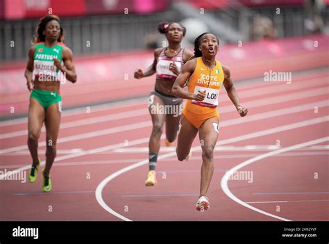 Marie-Josée Ta Lou competing in the 100 meters of the Tokyo 2020 ...