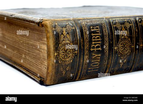 Spine of an old ancient holy bible Stock Photo - Alamy