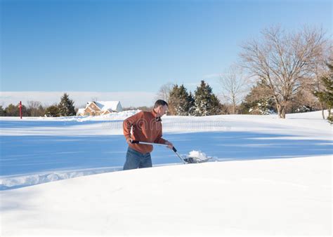 Senior Adult Man Trying To Dig Out Drive in Snow Stock Photo - Image of ...