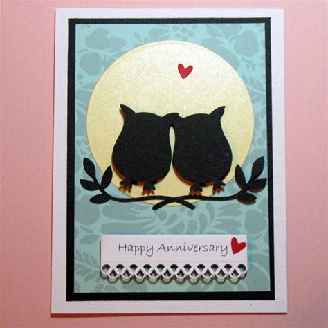 An Anniversary Card With Two Owls Sitting On A Branch