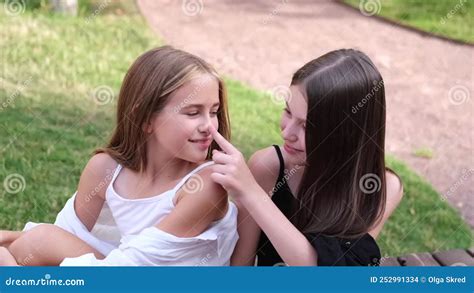 Happy And Lucky To Have A Sister Two Girls Outdoors In Black And White Clothes Good And Bad