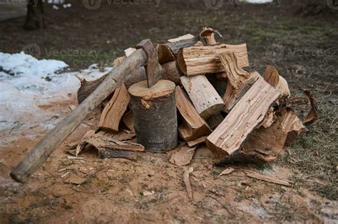 Still Life With A Wood Burning Ax And Firewood For The Winter In Rustic