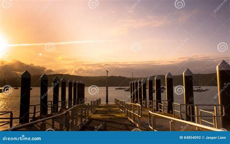 Sunset at docks stock photo. Image of sunset, sunrays - 84854092