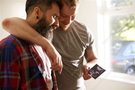 Male Gay Couple Looking At Ultrasound Photo Stock Image F Science Photo Library