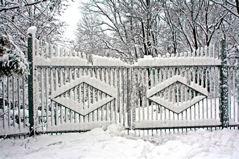 Gates covered with snow stock photo. Image of seasonal - 12324266