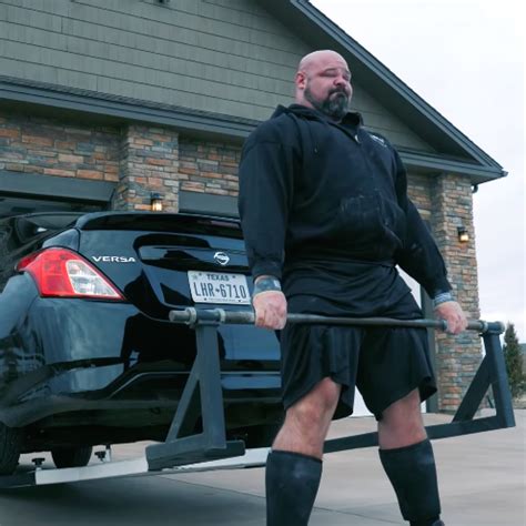 Strongman Brian Shaw Performs a Car Deadlift