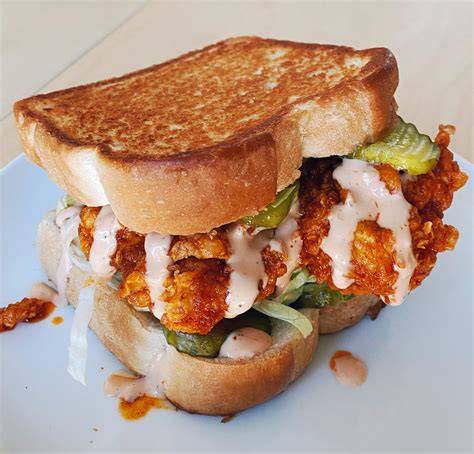 Nashville Style Chicken Sandwich : Top with chicken, then lettuce.