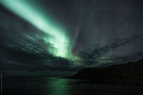 "Aurora Borealis Over Iceland" by Stocksy Contributor "Luke Gram" - Stocksy