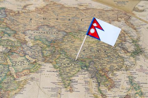 Nepal Flag Pin on a World Map Stock Image - Image of area, flagpin ...