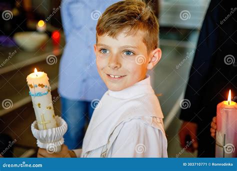 Little Kid Boy Receiving His First Holy Communion Happy Child Holding