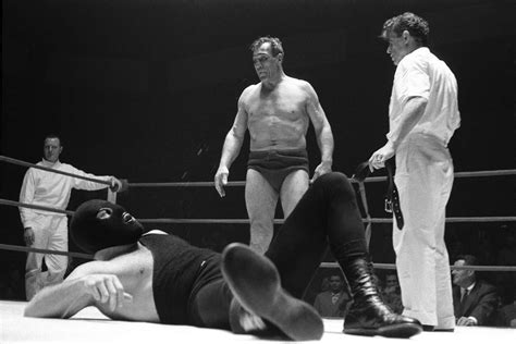 Download Italian Boxer Primo Carnera Staring Down The Masked Man