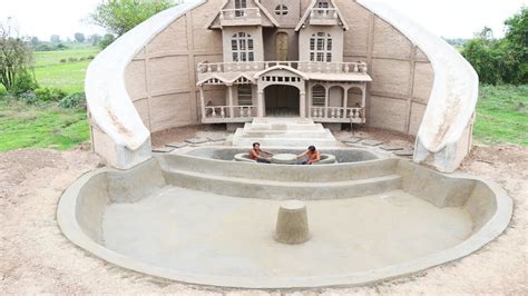 Build Swimming Pool And Twin Water Slide Around Mud Victorian House By